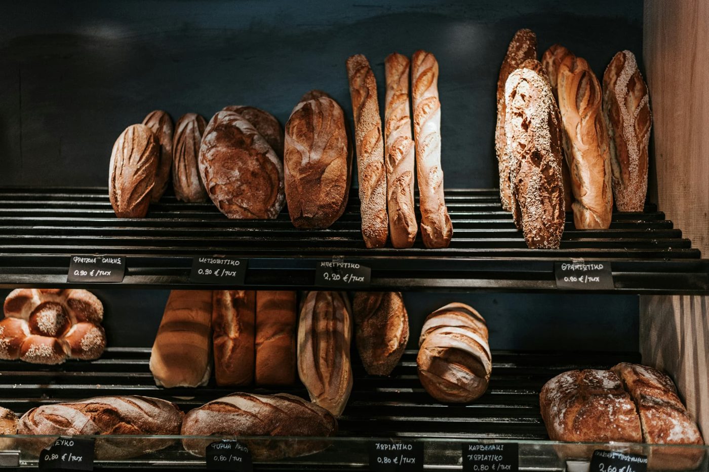 Artisan bread loaves on bakery shelves